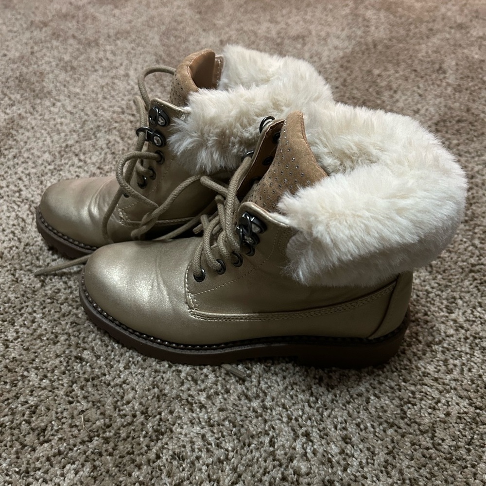 Women's Sprit brush gold lace up booties.